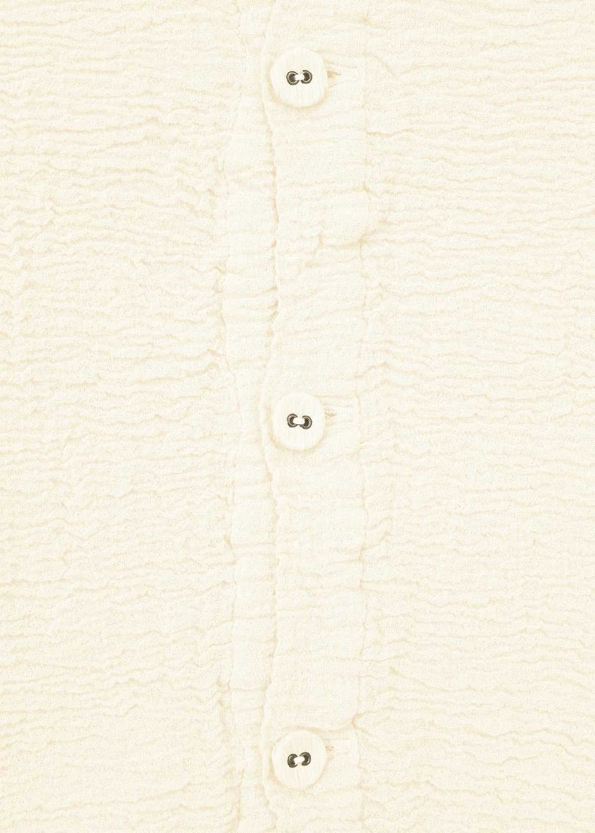 A detail shot of the HAAT KYO CHIJIMI 2WAY JANUARY 1 shirt.