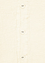 A detail shot of the HAAT KYO CHIJIMI 2WAY JANUARY 1 shirt.