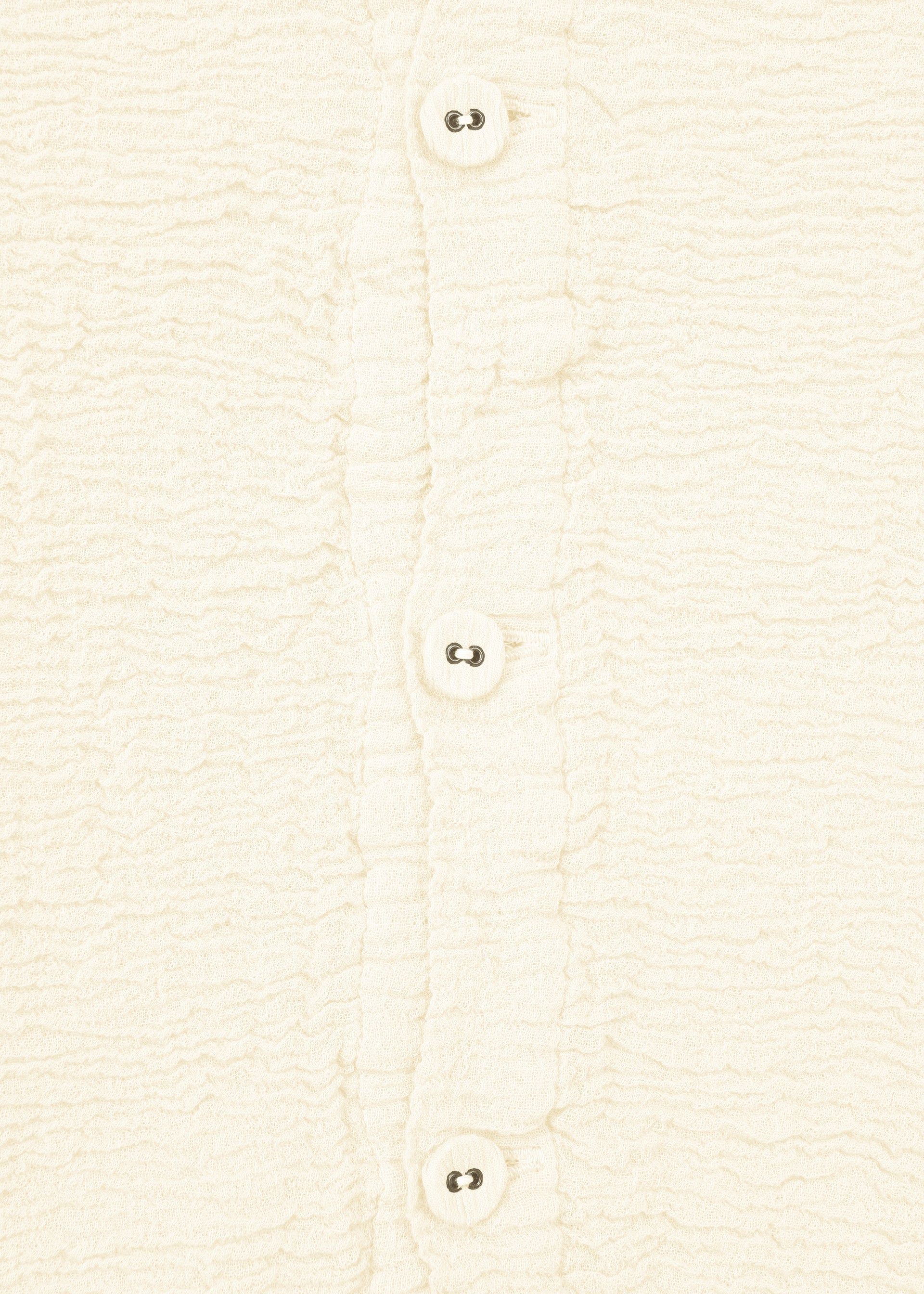 A detail shot of the HAAT KYO CHIJIMI 2WAY JANUARY 1 shirt.