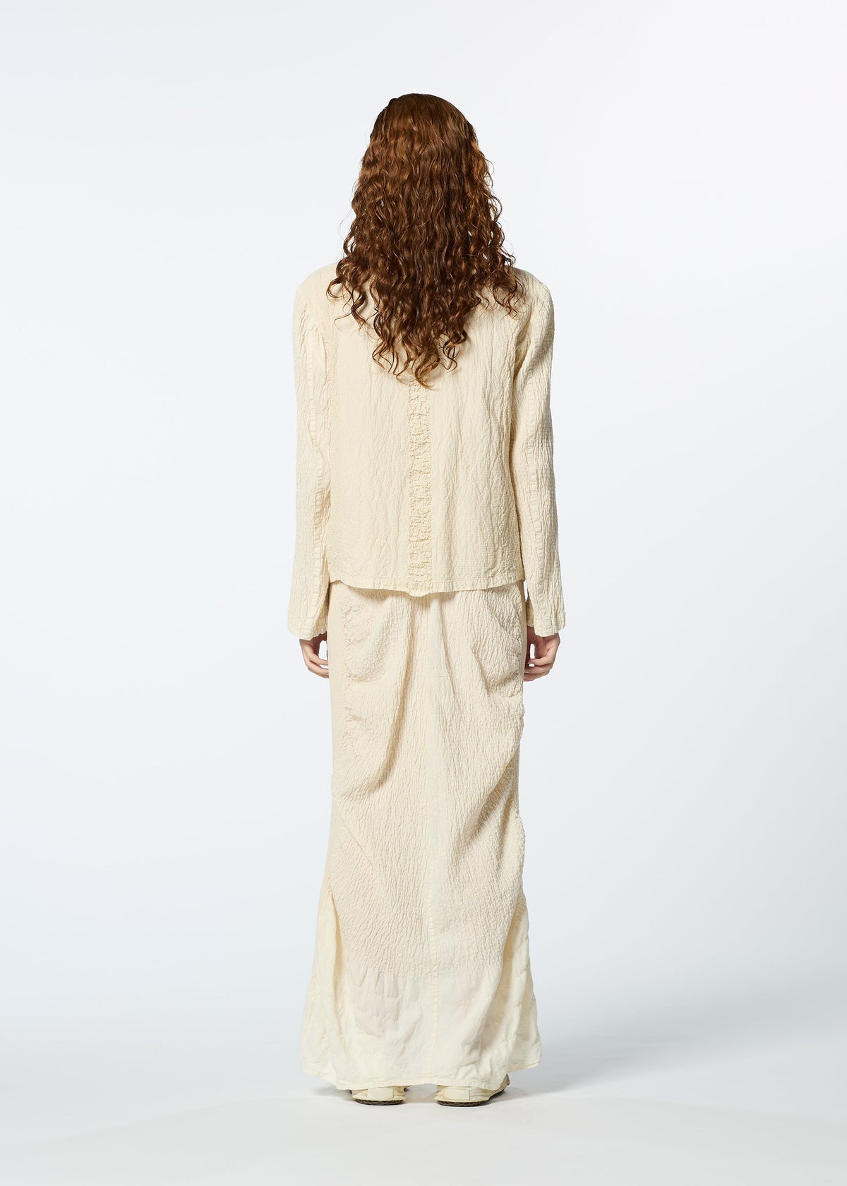 A model wears the HAAT TENMOKU COTTON shirt.