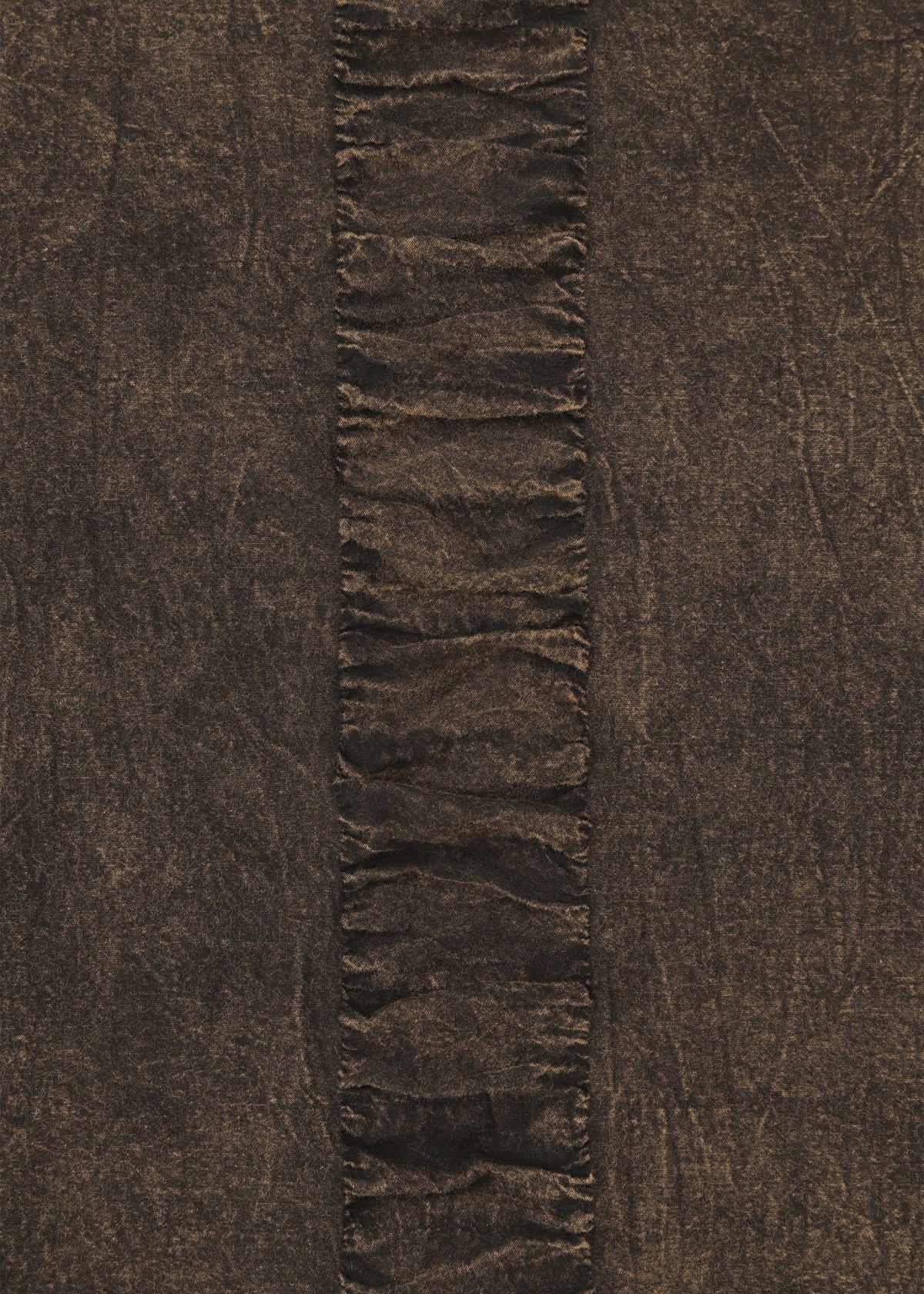A detail shot of the HAAT TENMOKU COTTON shirt.