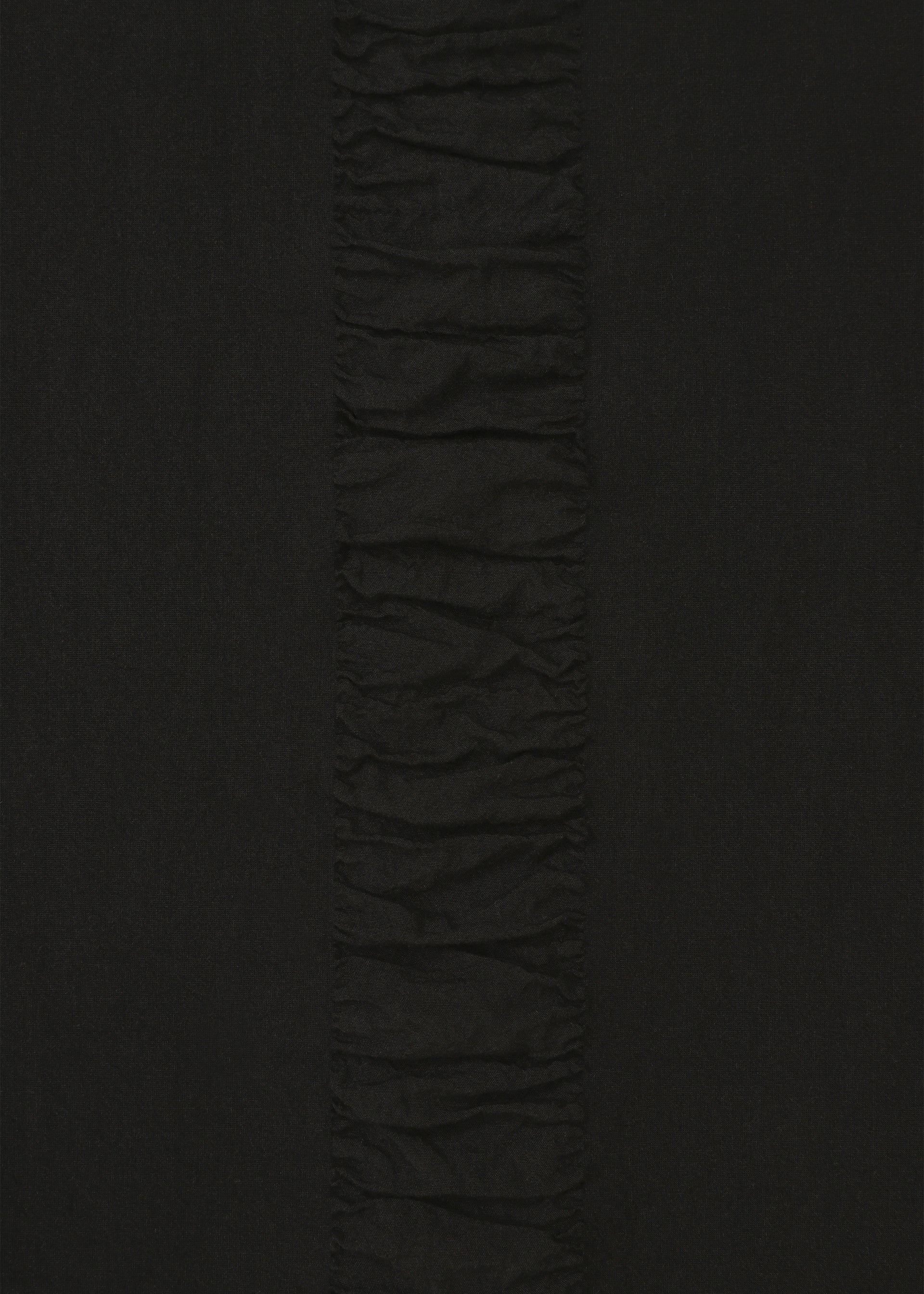 A detail shot of the HAAT TENMOKU COTTON shirt.