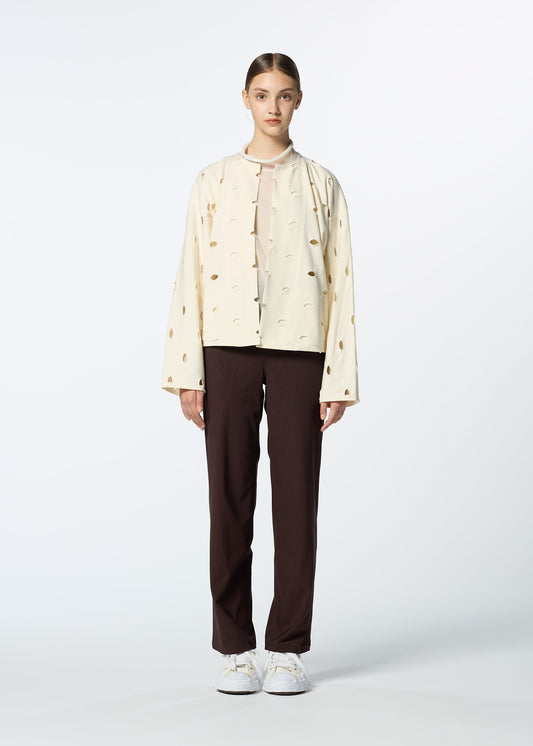 A model wears the HAAT HOLES cardigan.