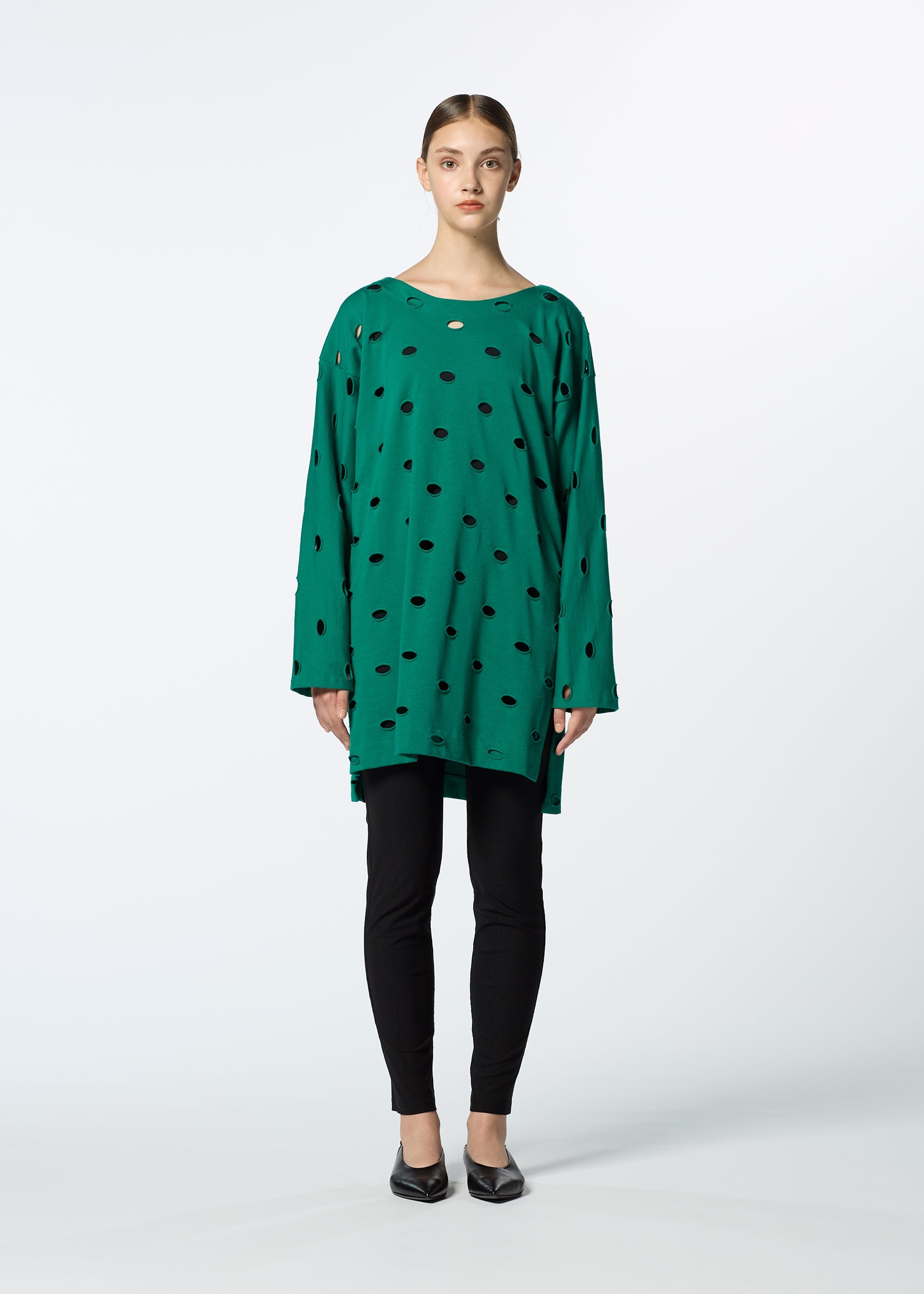 A model wears the HAAT HOLES tunic.