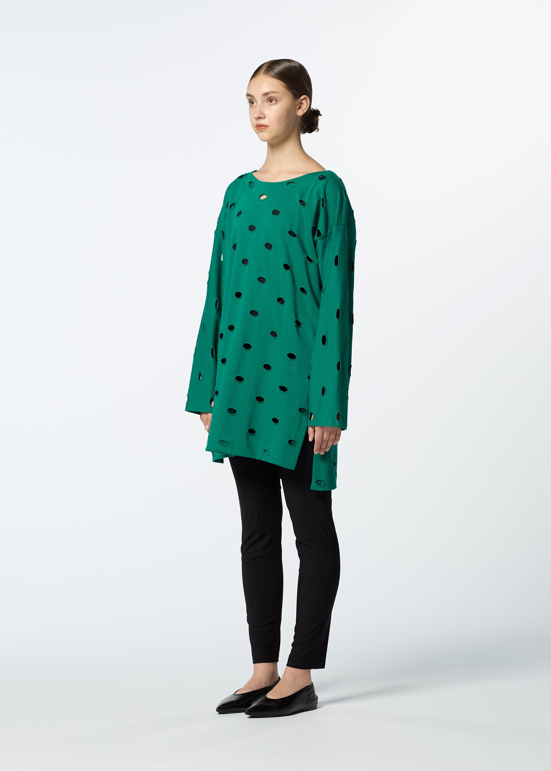 A model wears the HAAT HOLES tunic.