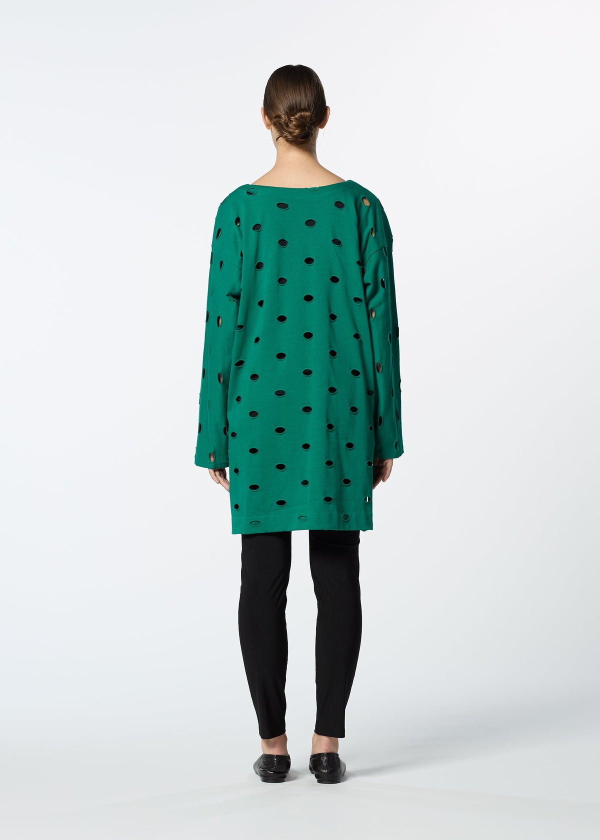 A model wears the HAAT HOLES tunic.