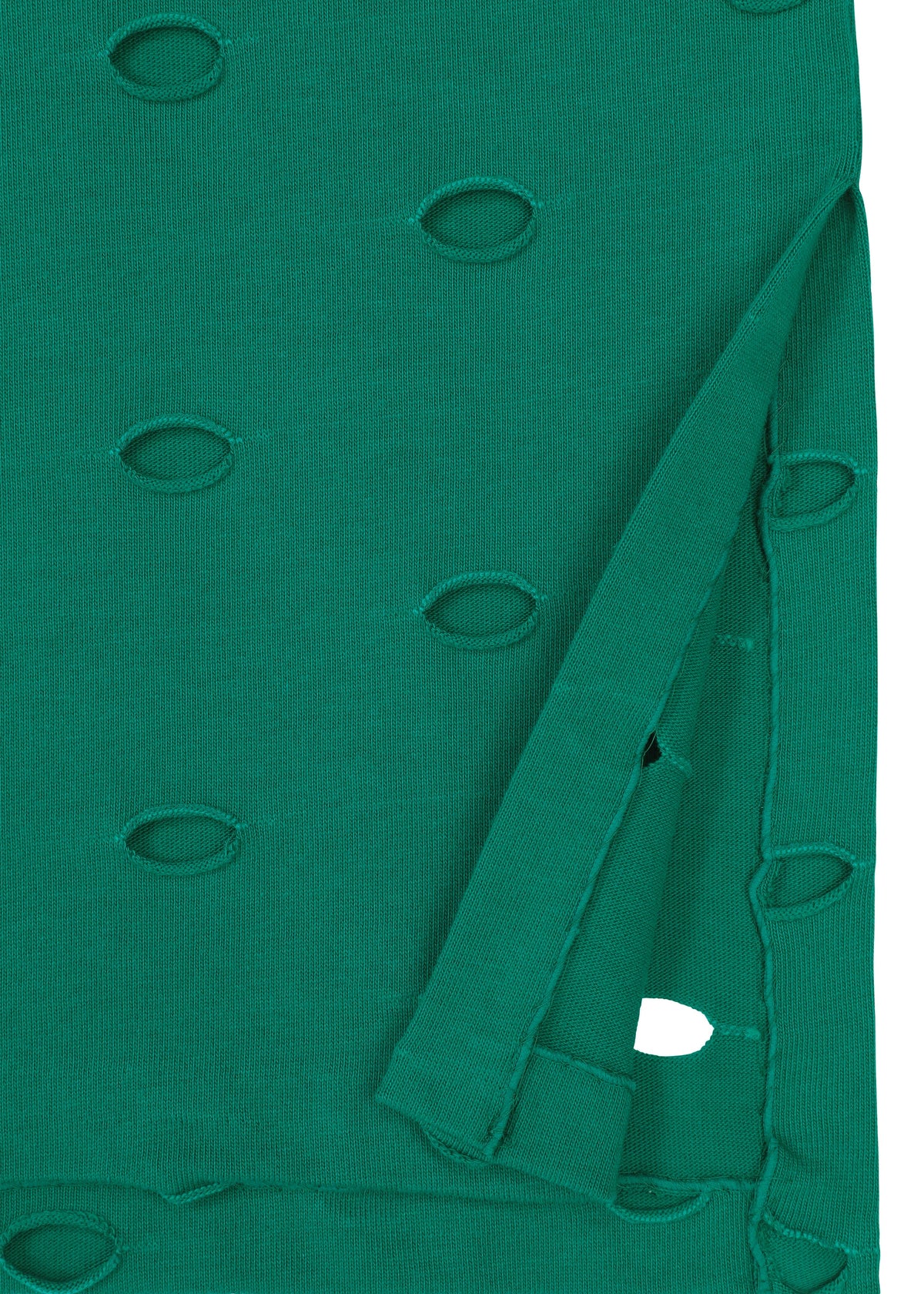 A detail shot of the HAAT HOLES tunic.