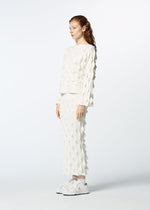 A model wears the HAAT ZIG ZAG KNIT skirt.