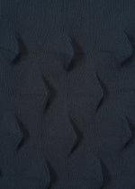 A detail shot of the HAAT ZIG ZAG KNIT skirt.