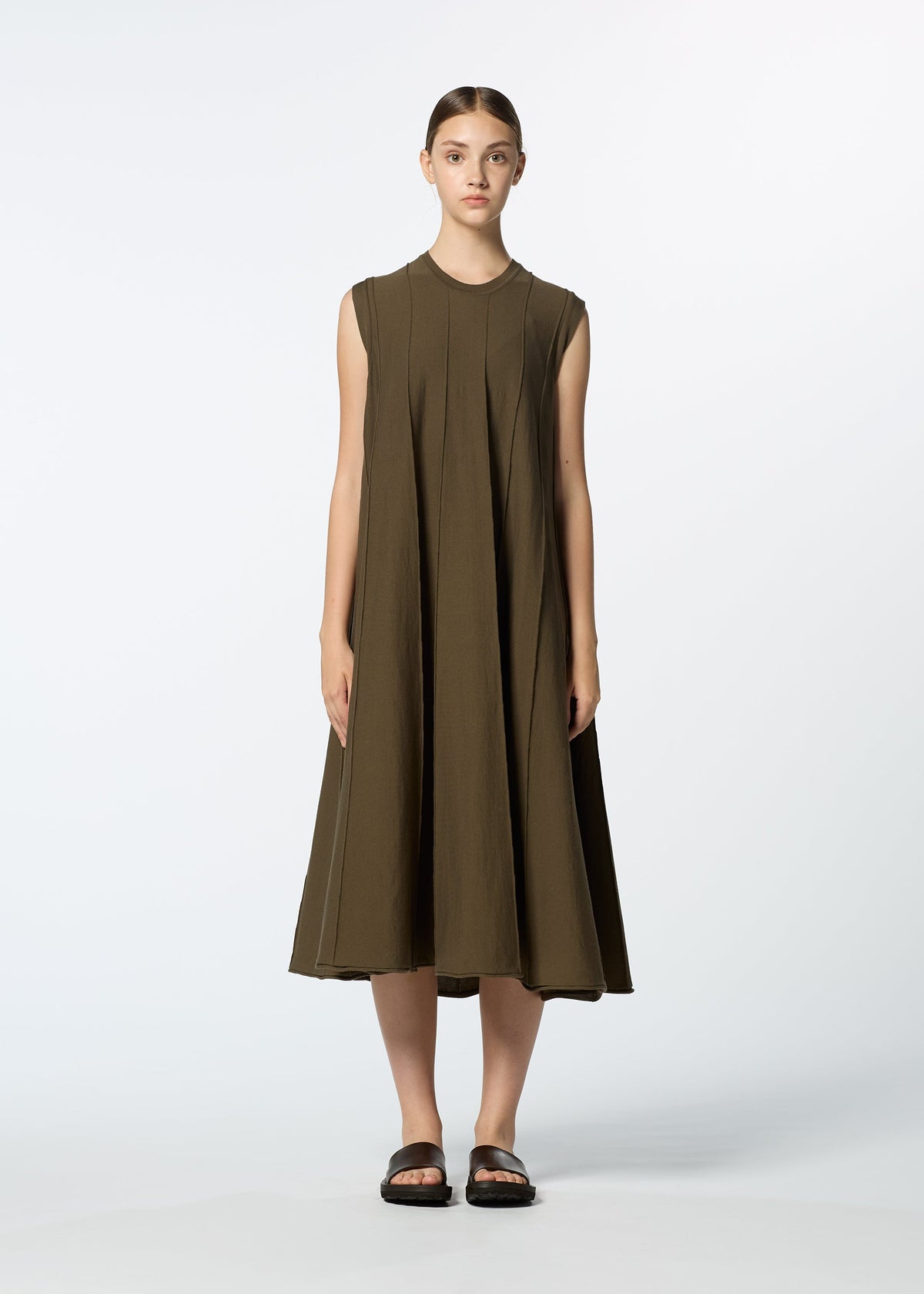 A model wears the HAAT RADIAL LINE KNIT dress.