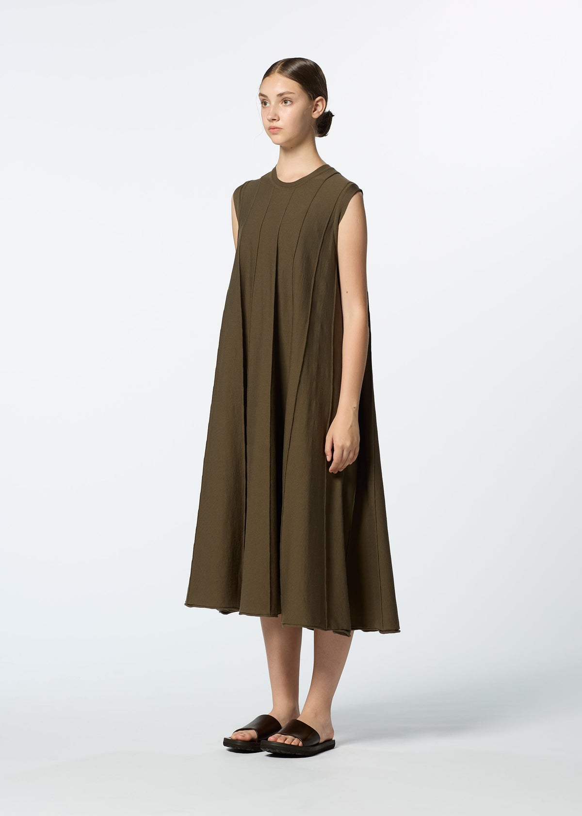 A model wears the HAAT RADIAL LINE KNIT dress.