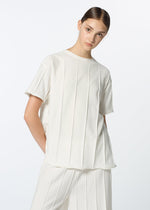A model wears the HAAT RADIAL LINE KNIT shirt.