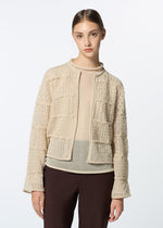A model wears the HAAT CURLING SHEER KNIT cardigan.