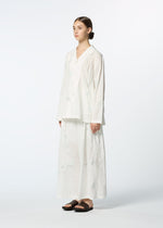 A model wears the HAAT DAMI LEAVES trousers.
