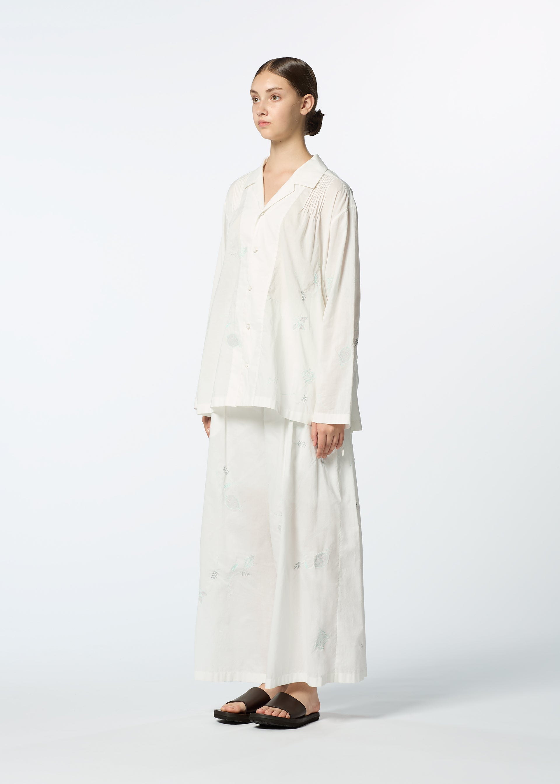 A model wears the HAAT DAMI LEAVES trousers.