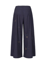 A detail shot of the HAAT DAMI LEAVES trousers.