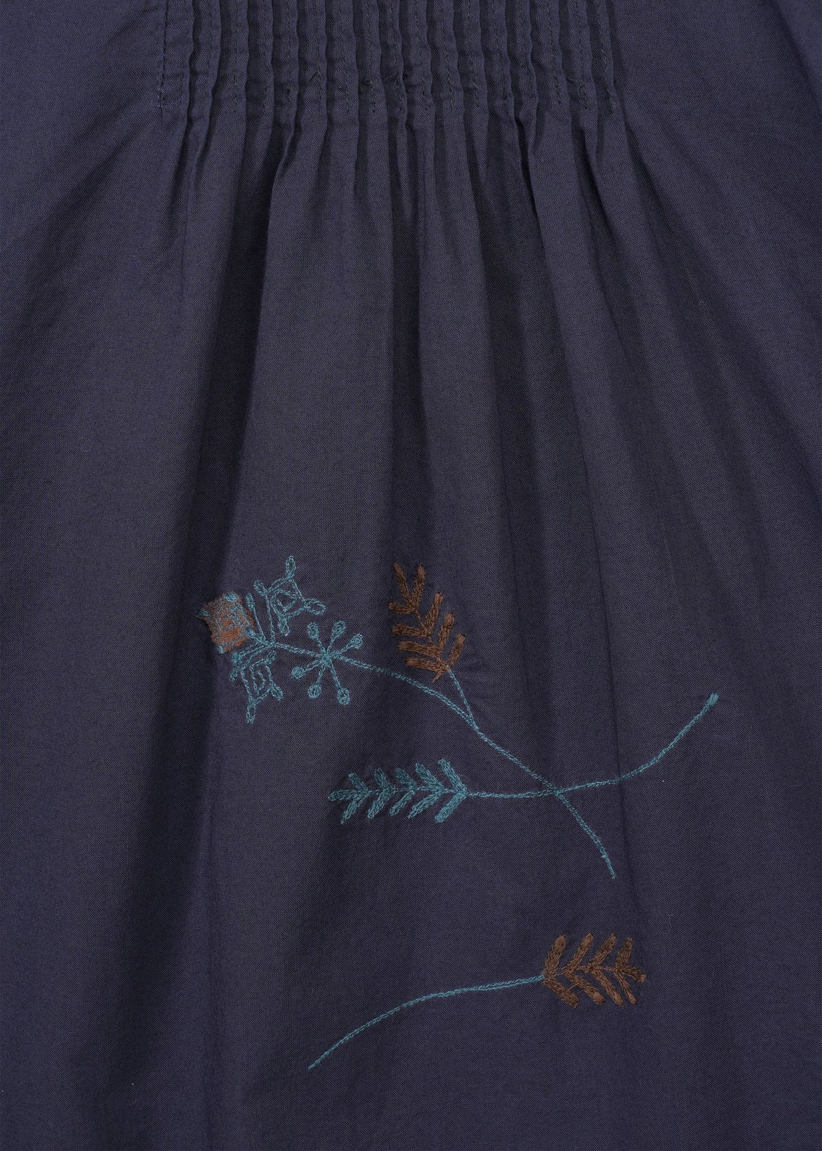 A detail shot of the HAAT DAMI LEAVES trousers.