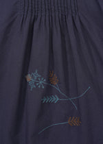 A detail shot of the HAAT DAMI LEAVES trousers.