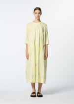 A model wears the HAAT DAMI LEAVES dress.