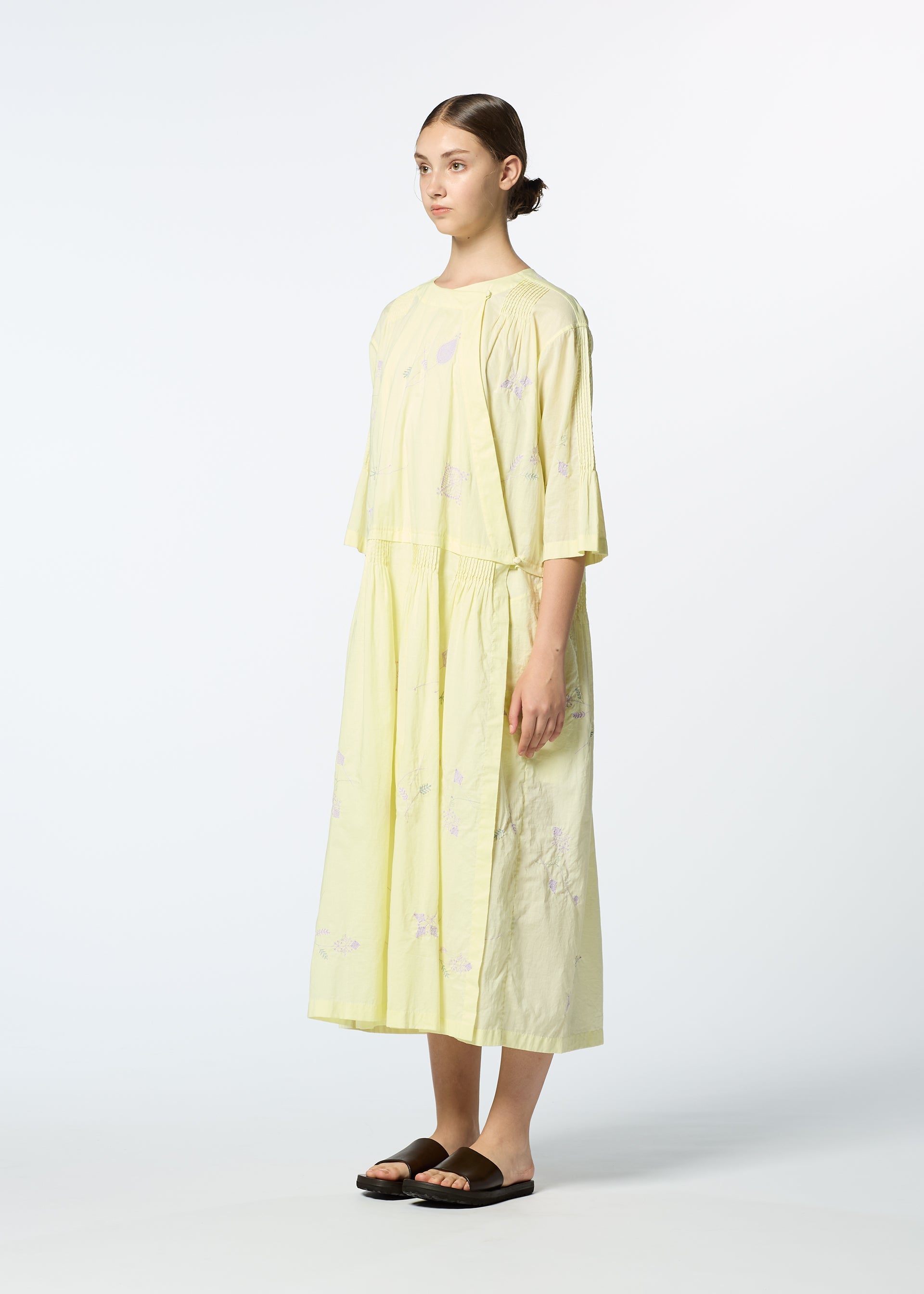 A model wears the HAAT DAMI LEAVES dress.