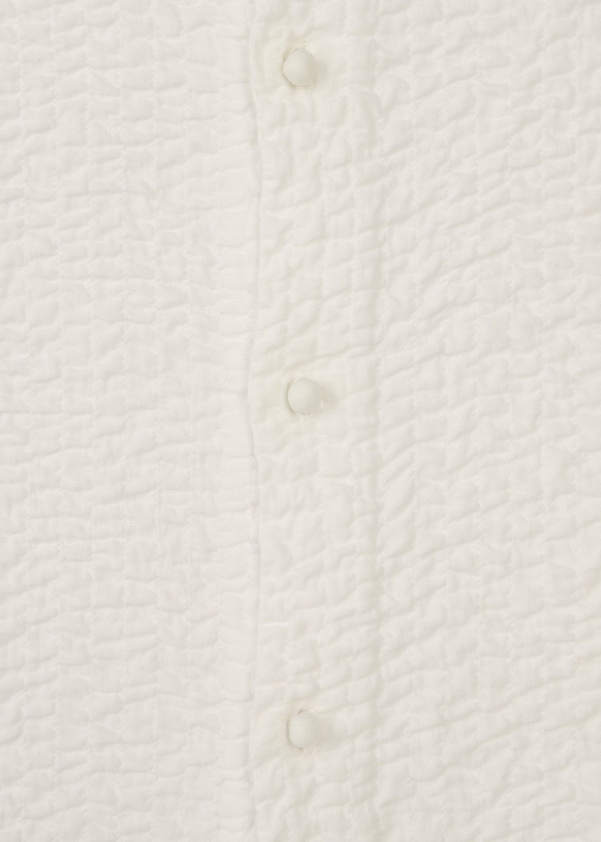 A detail shot of the HAAT 3 MUL MACHINE KABIRA '26SS clothing.