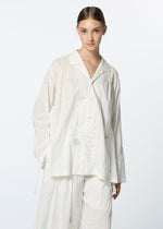 A model wears the HAAT DAMI LEAVES shirt.