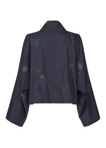 A detail shot of the HAAT DAMI LEAVES cardigan.