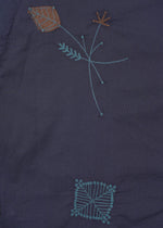 A detail shot of the HAAT DAMI LEAVES cardigan.