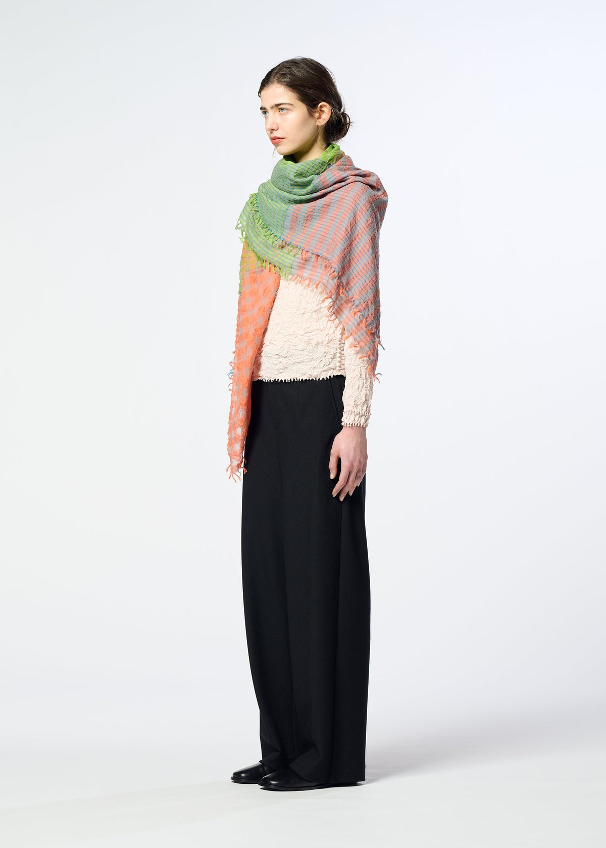A model wears the HaaT TRIPLY SQUARE STOLE triply-square-stole-stole-monochrome.