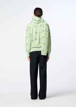 A model wears the HaaT RIBBON KNIT ribbon-knit-stole-black.