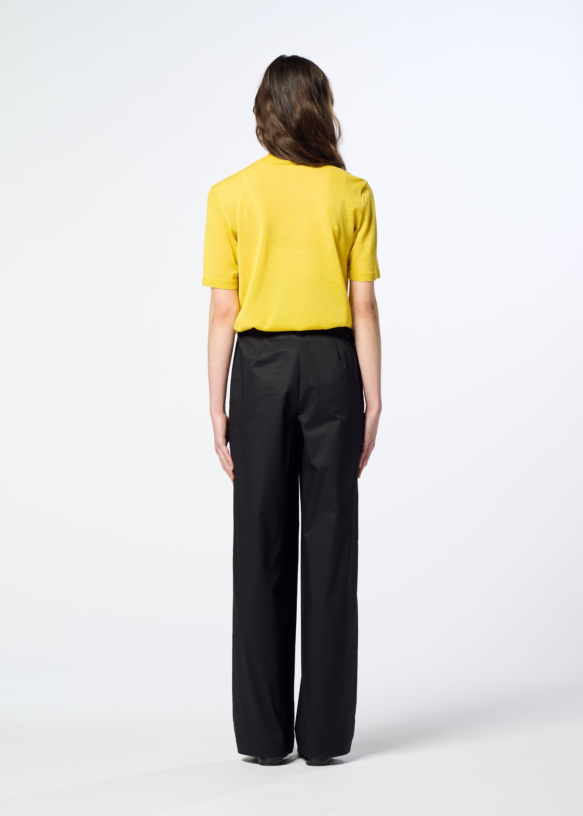 A model wears the HaaT COTTON STRETCH BOTTOM cotton-stretch-bottom-full-length-trousers-black.