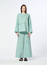 A model wears the HaaT ONE STROKE DRAW trousers.