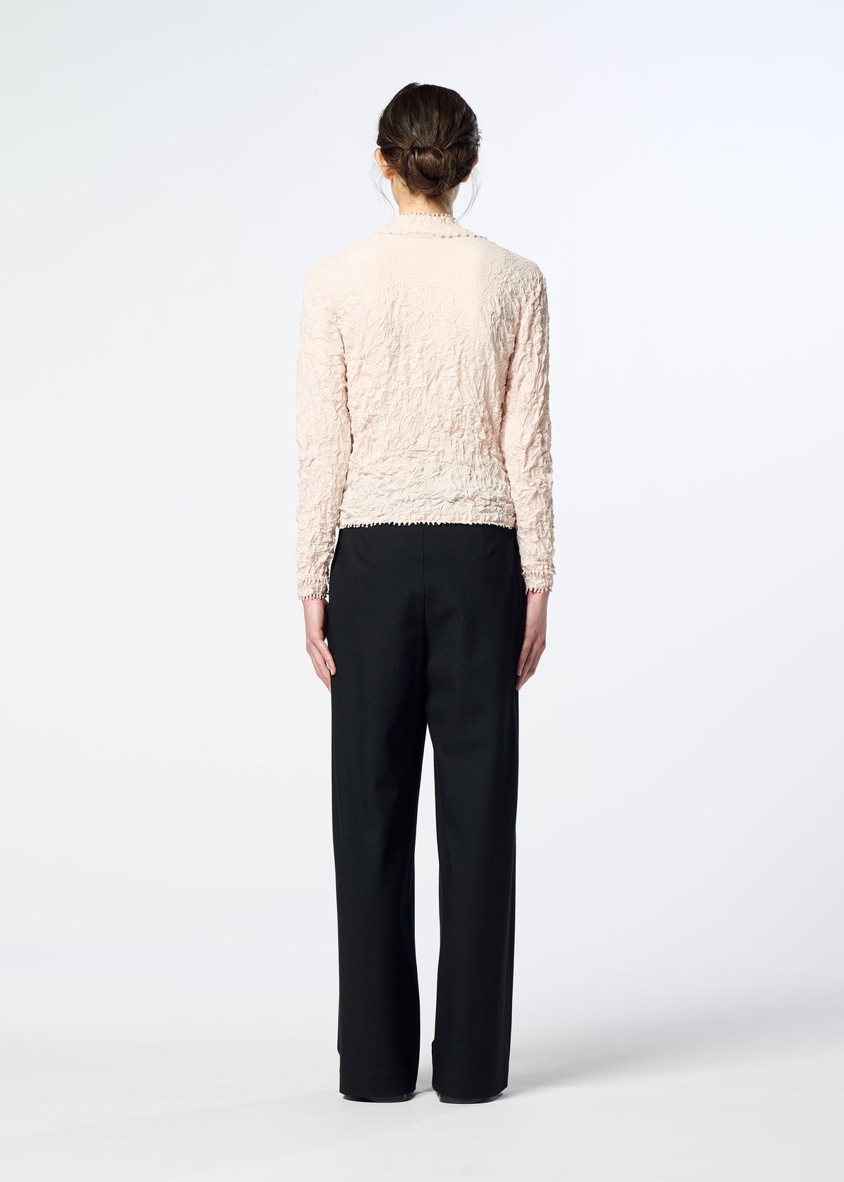 A model wears the HaaT FLANNEL BOTTOM flannel-bottom-trousers-dark-brown.