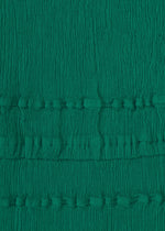 A detail shot of the HaaT KYO CHIJIMI TSUCHIKABE trousers.