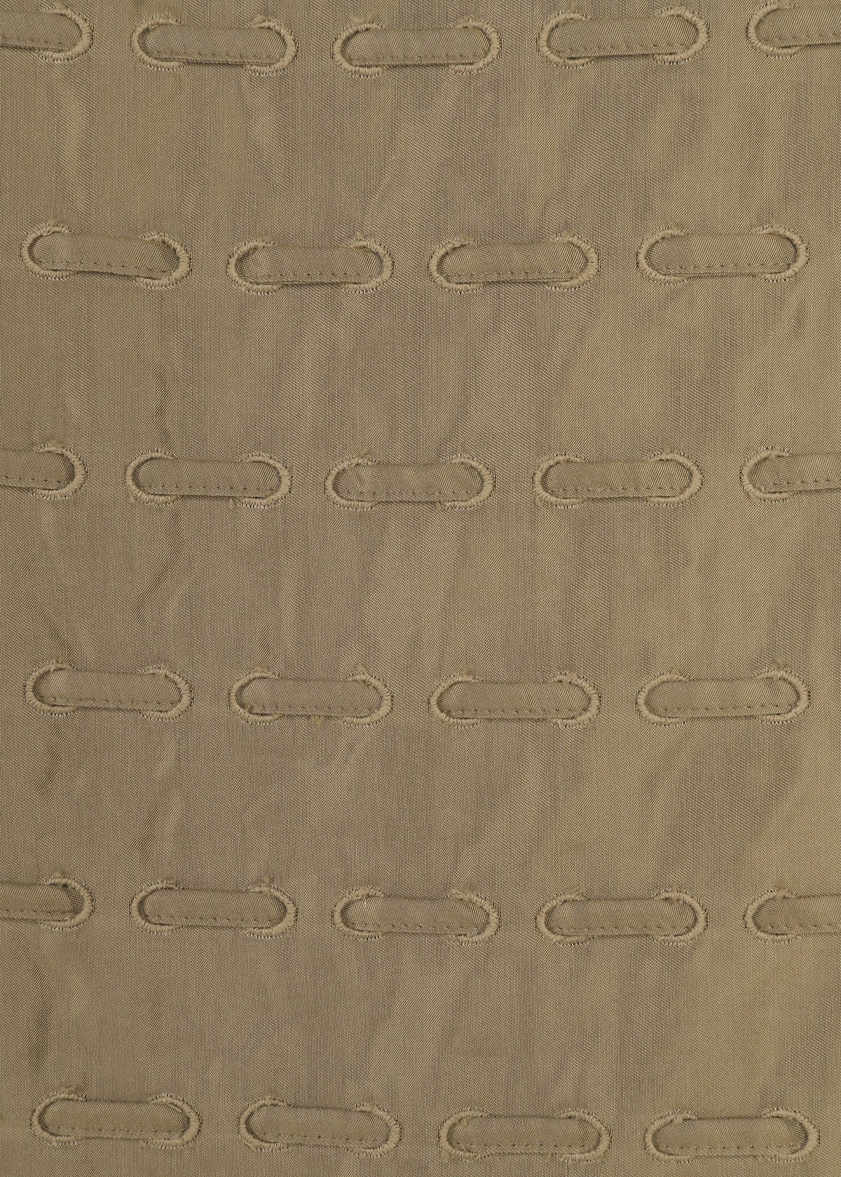 A detail shot of the HaaT HOLE & LINE skirt.