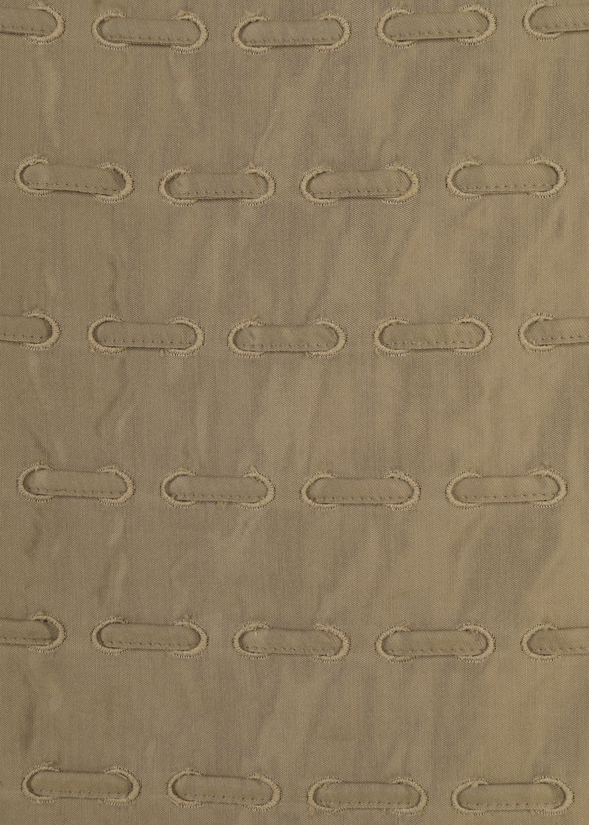 A detail shot of the HaaT HOLE & LINE skirt.