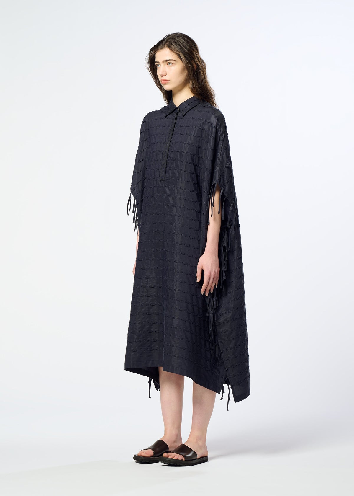 A model wears the HaaT HOLE & LINE hole-line-dress-navy.