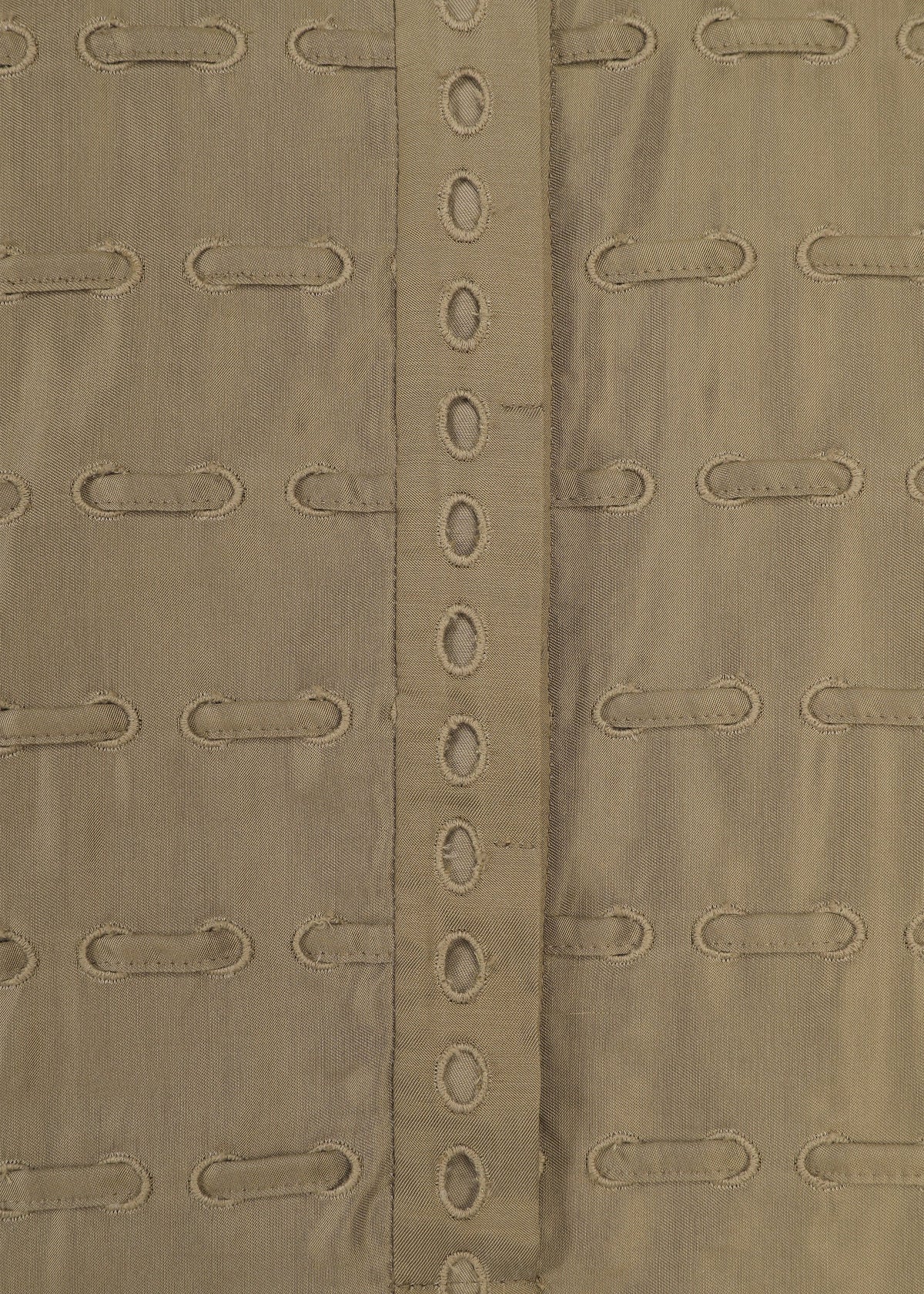 A detail shot of the HaaT HOLE & LINE dress.