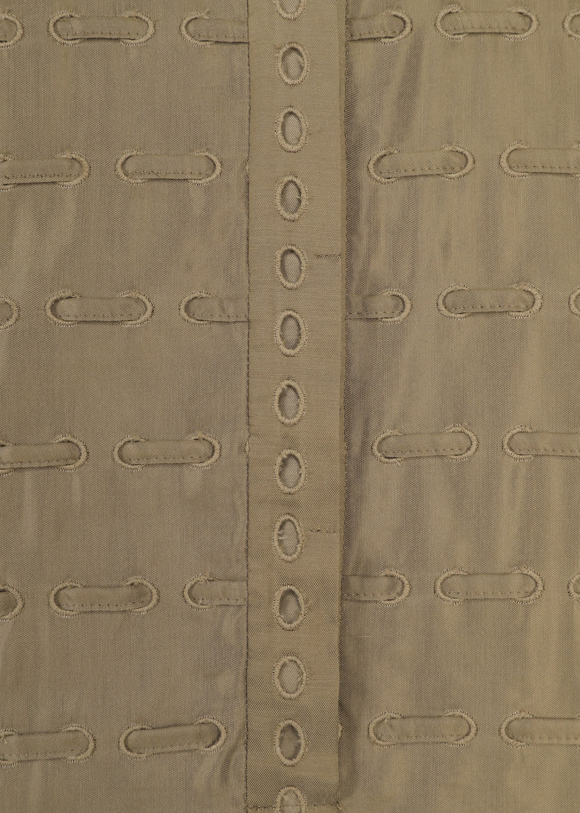 A detail shot of the HaaT HOLE & LINE dress.