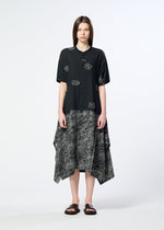 A model wears the HaaT ONE STROKE DRAW dress.