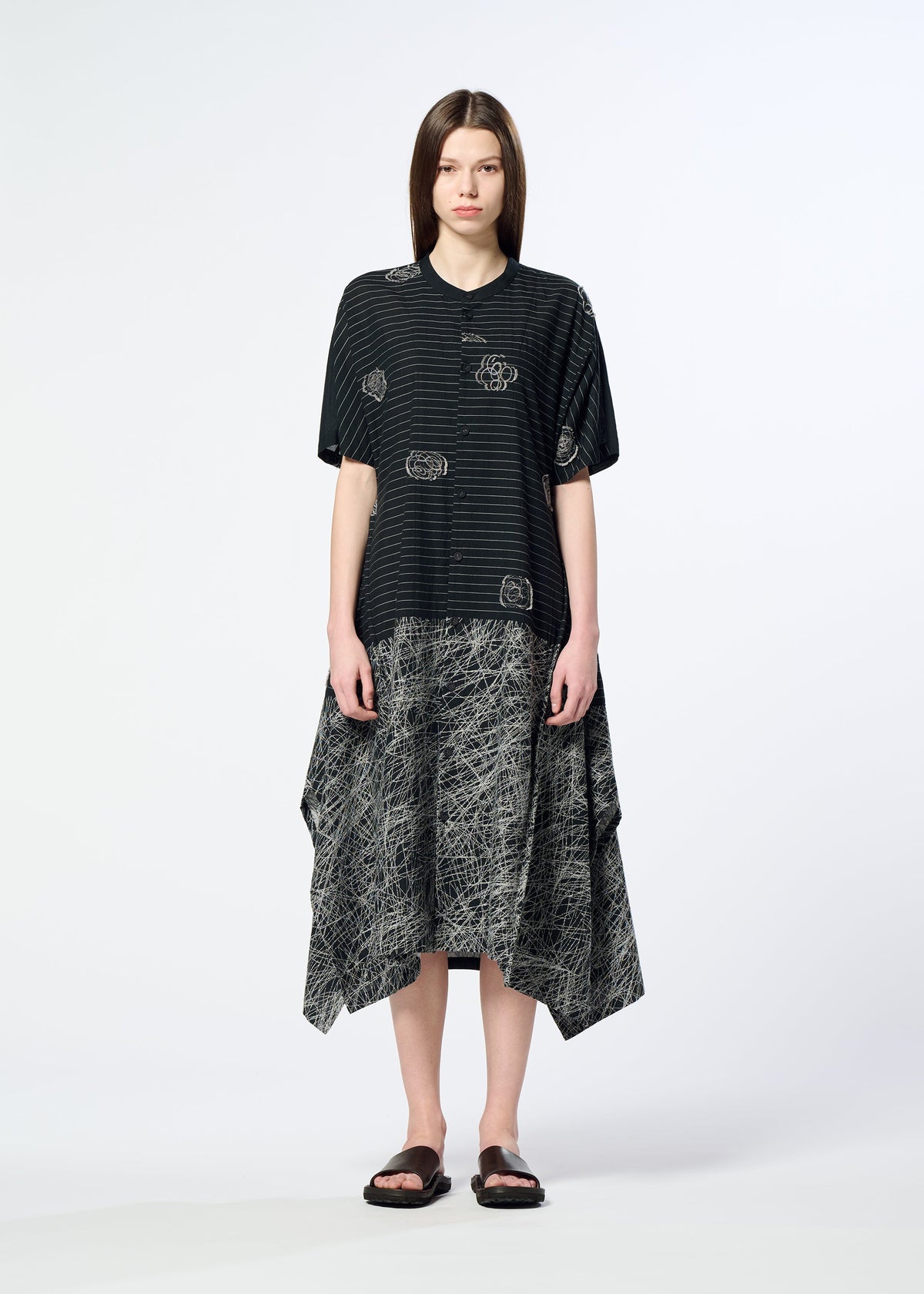 A model wears the HaaT ONE STROKE DRAW dress.