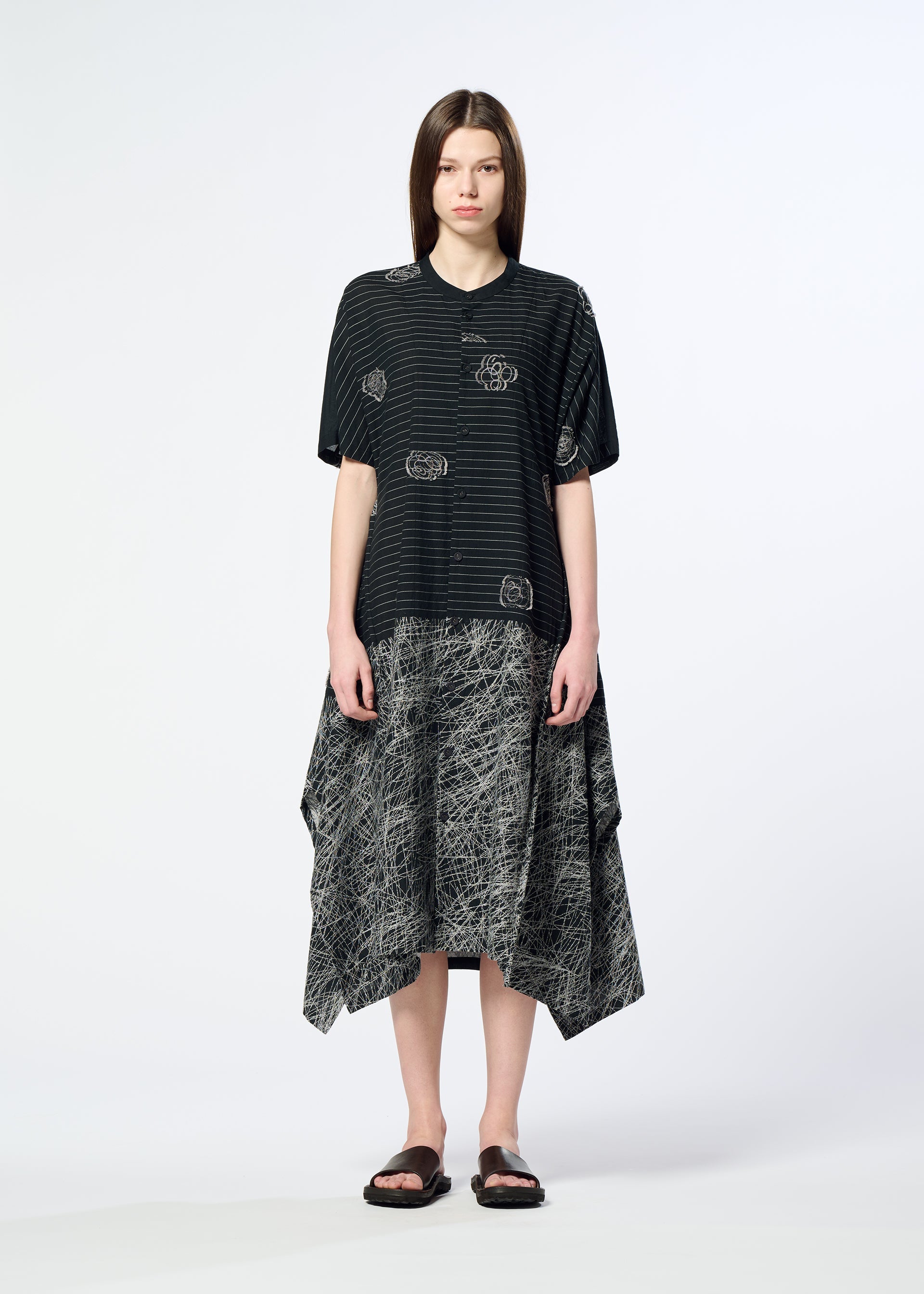 A model wears the HaaT ONE STROKE DRAW dress.