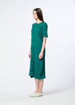 A model wears the HaaT KYO CHIJIMI TSUCHIKABE dress.