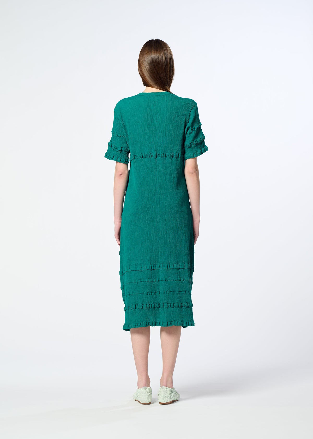 A model wears the HaaT KYO CHIJIMI TSUCHIKABE dress.