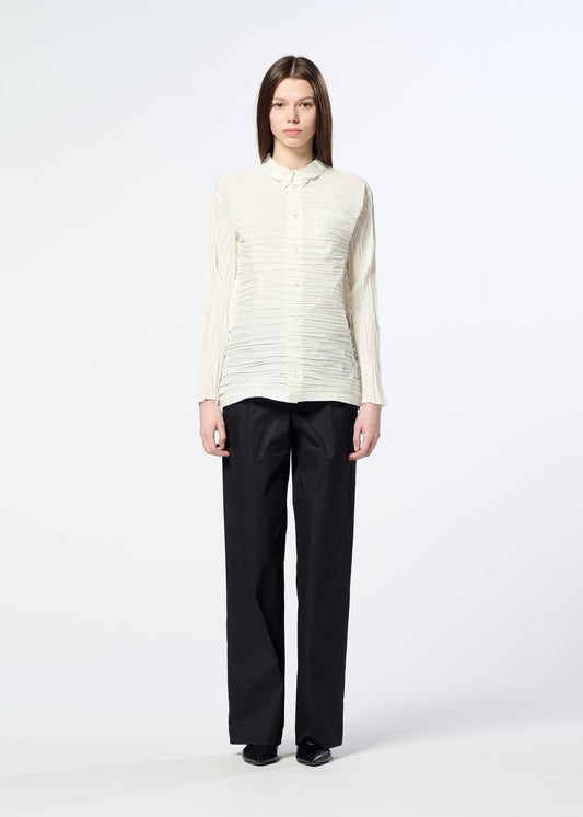 A model wears the HaaT SHIBARI SHIRT shibari-shirt-shirt-white-1.