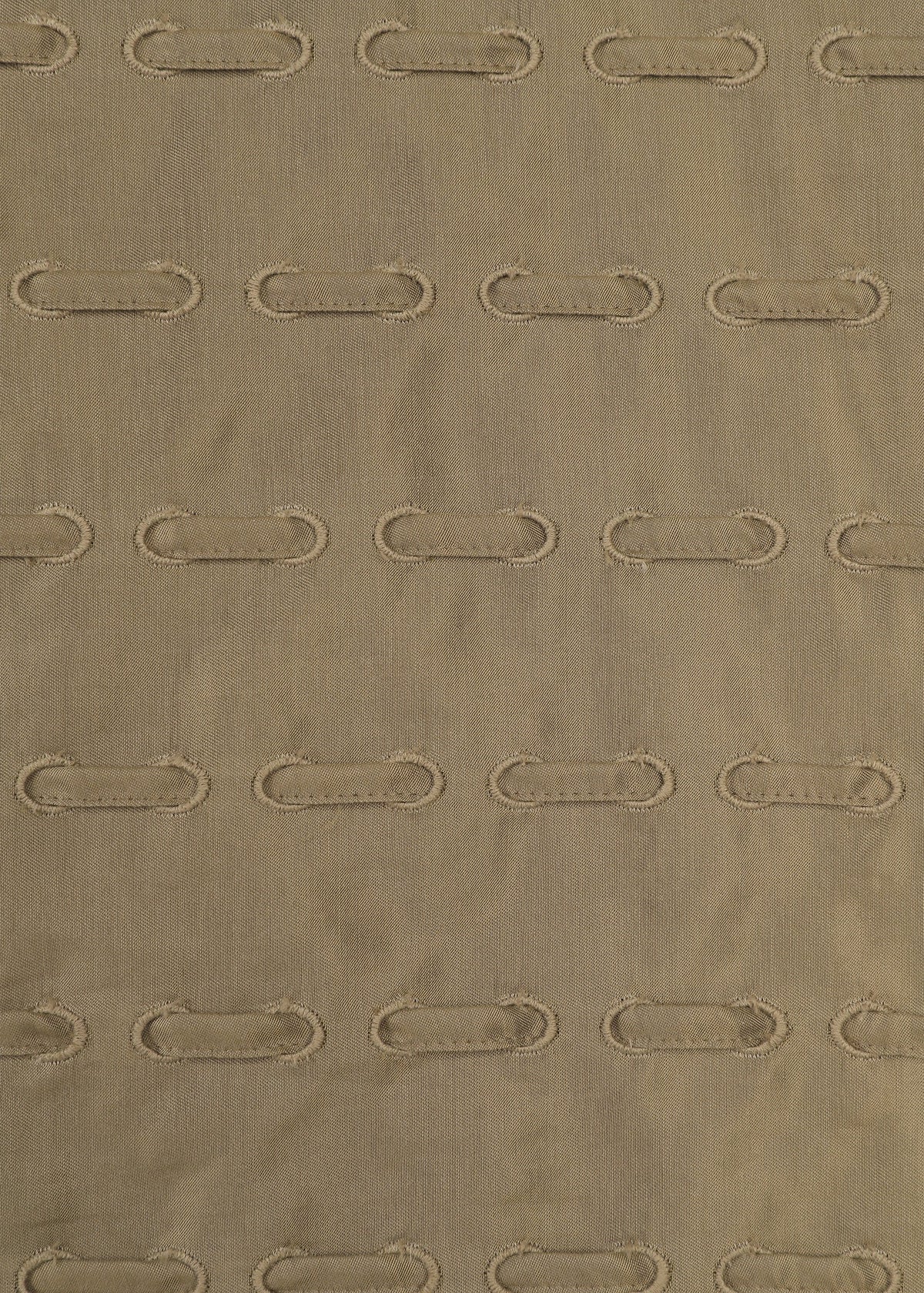 A detail shot of the HaaT HOLE & LINE top.