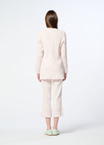A model wears the HaaT KYO CHIJIMI TSUCHIKABE top.
