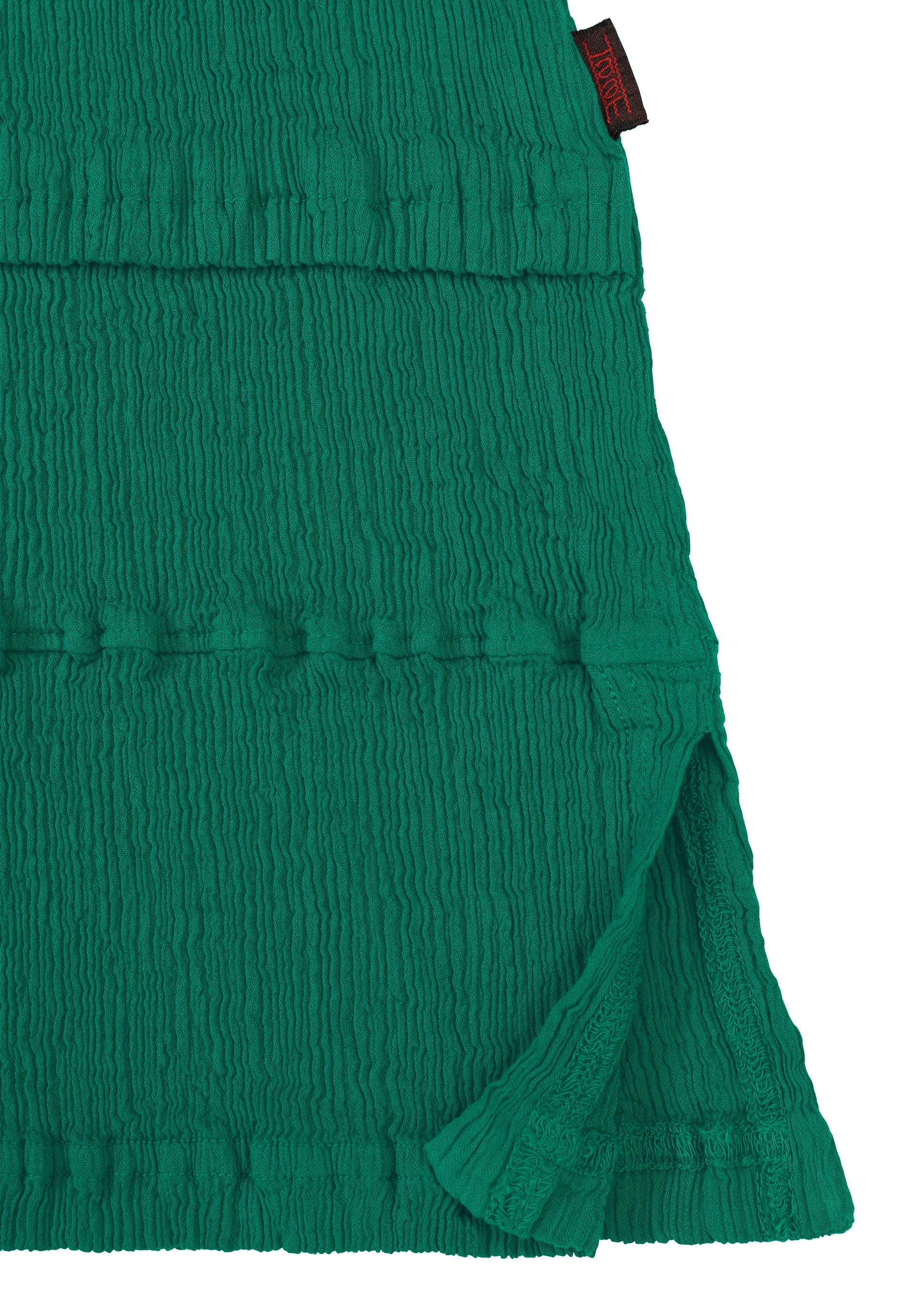 A detail shot of the HaaT KYO CHIJIMI TSUCHIKABE top.