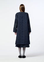 A model wears the HaaT COLLAGE STRETCH Ⅰ collage-stretch-i-top-navy.