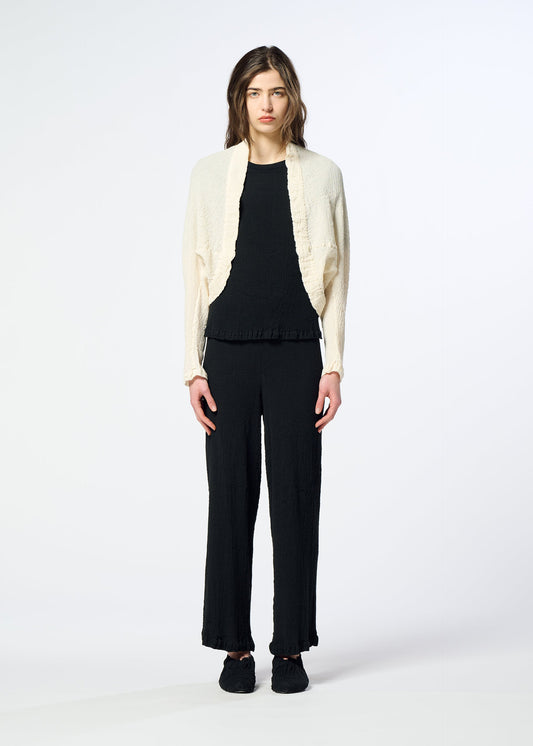 A model wears the HaaT KYO CHIJIMI 2WAY kyo-chijimi-2way-open-front-cardigan-ivory.